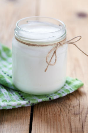 Probiotic-rich yogurt in a jar which is beneficial for your overall health by promoting a healthy balance in the gut.