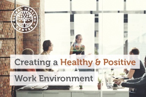 Employees having a positive work meeting. A healthy and positive work enviroment is vital for your health.