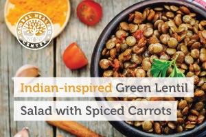 A bowl of green lentil salad with spiced carrots. This vegan dish is loaded with nutrients and provides many health benefits.