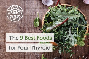 A wooden bowl of organic green leafy vegetables. The thyroid needs very specific foods to maintain proper function.