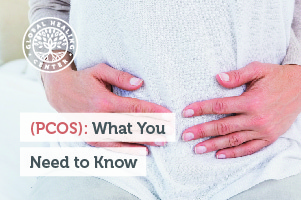 A woman is holding her stomach. PCOS occurs when the ovaries are not functioning properly and cannot release an egg.