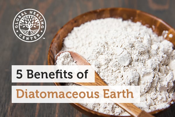 A wooden bowl filled with diatomaceous earth in a powder form. It helps promote blood lipids and help detoxify toxic metals.