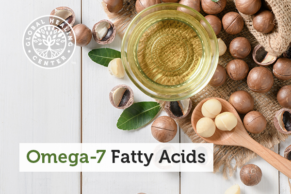 A bowl of macadamia oil and macadamia nuts which are a great source of omega-7.